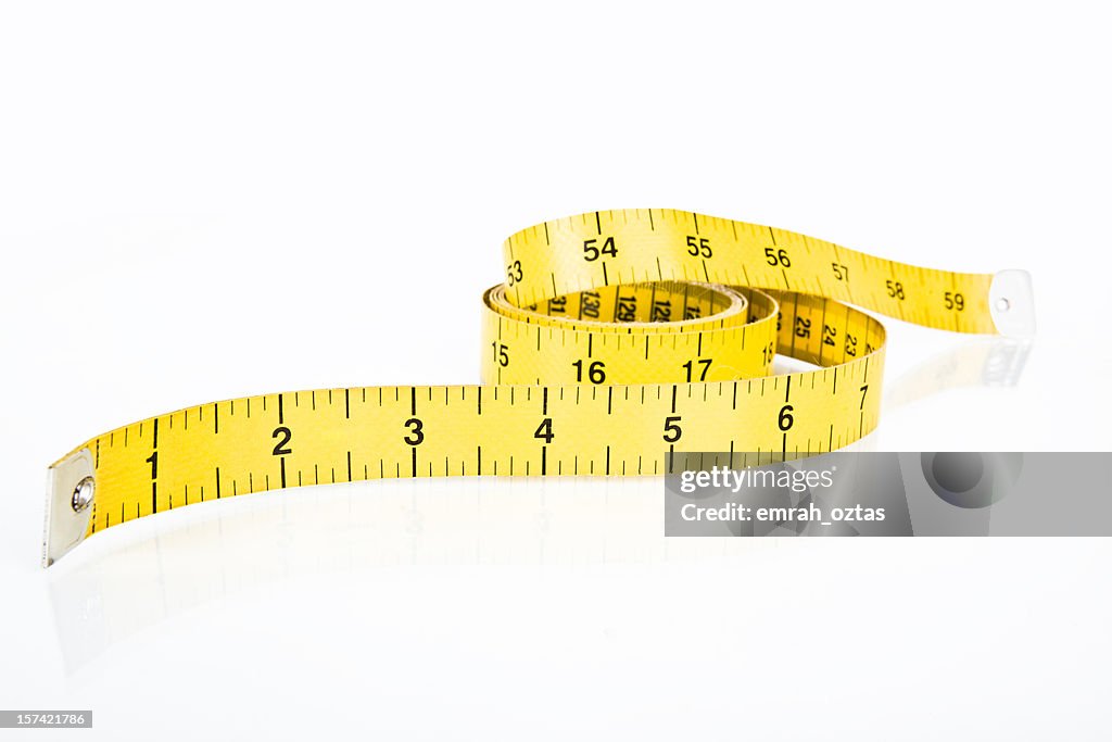 Fabric Measuring Tape In Yellow High-Res Stock Photo - Getty Images