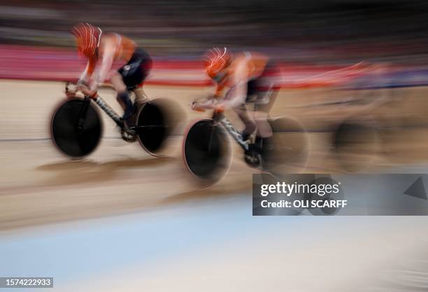 Netherlands take part in a women's Elite Team Sprint qualification race at the Sir Chris Hoy velodrome during the Cycling World Championships in...