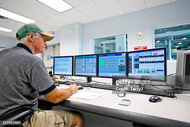 technician monitoring in control room - aquatic plant stock pictures, royalty-free photos & images