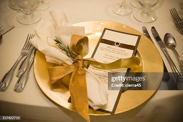 gold and linen place settling with rosemary - wedding table setting stock pictures, royalty-free photos & images