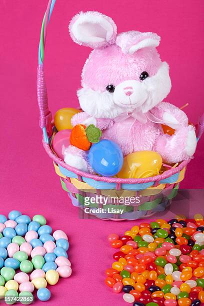 easter goodies - easter basket with candy stock pictures, royalty-free photos & images