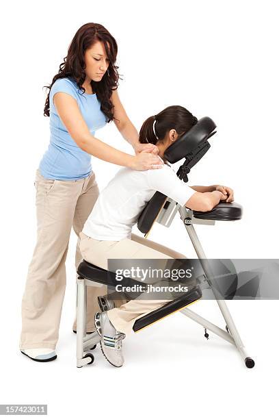 massage im massagestuhl - massagestuhl stock-fotos und bilder