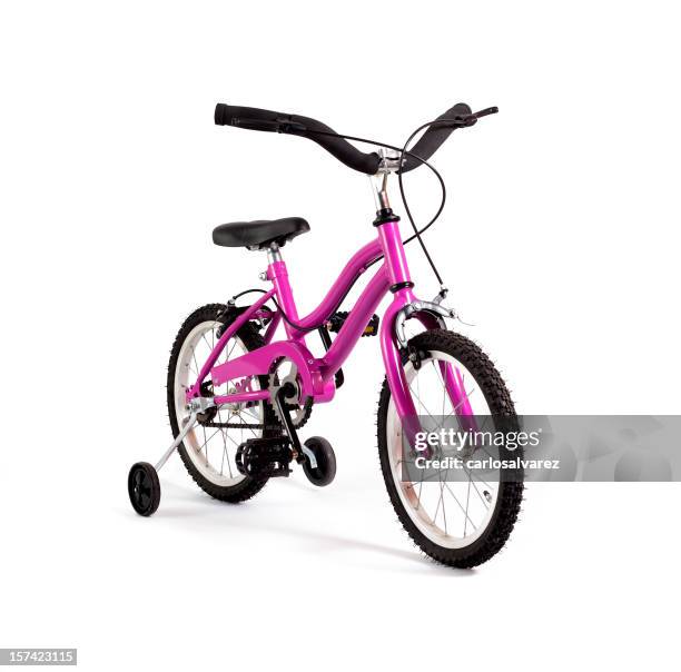 girl bicycle, training wheels - training wheels stock pictures, royalty-free photos & images