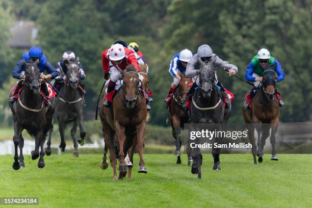 Oisin Murphy on Shuwari alongside Daniel Tudhope on Fallen Angel compete in The European Bloodstock News EBF Star Stakes at Sandown Park on July 27,...