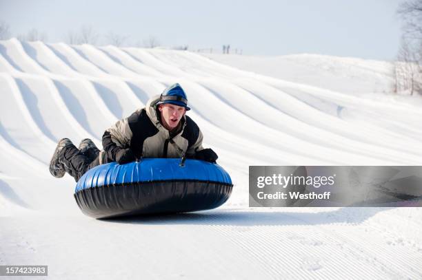 tubing - snow tubing stock pictures, royalty-free photos & images