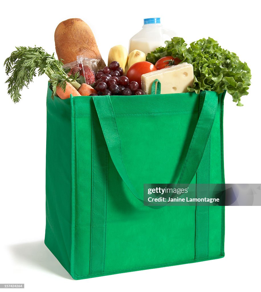 Close-up of reusable grocery bag filled with fresh produce