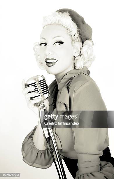 retro starlet with microphone - 40s pin up girls stock pictures, royalty-free photos & images