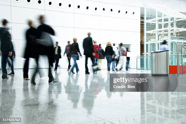 blurred people in modern interior - crowded elevator stockfoto's en -beelden