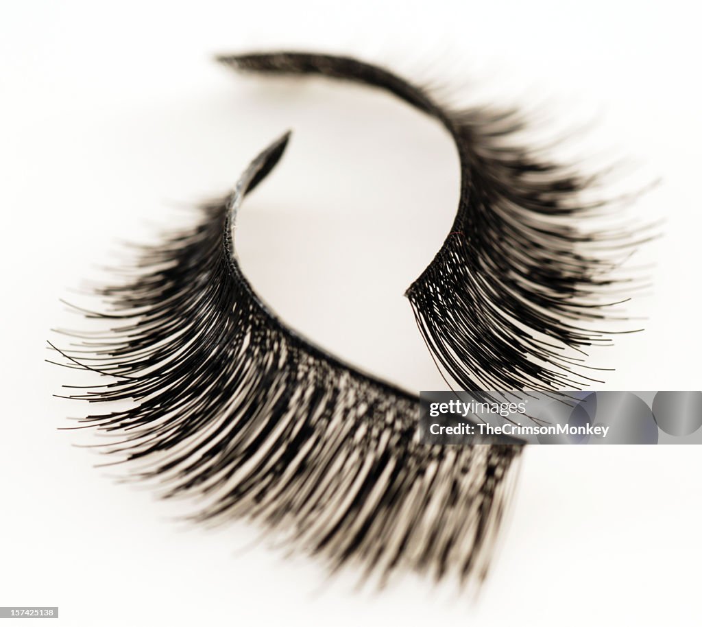 Set of false eyelashes isolated on white background