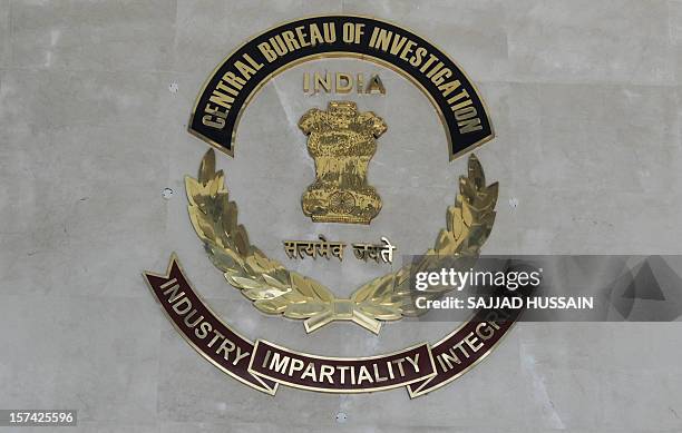 The Indian Central Bureau of Investigation logo is pictured at the CBI headquarters in New Delhi on December 3, 2012. The CBI is an Indian...