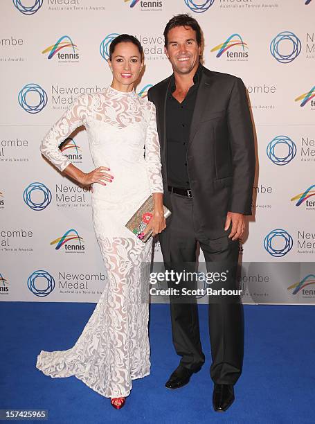 Pat Rafter and his wife Lara Feltham arrive ahead of the 2012 John Newcombe Medal at Crown Palladium on December 3, 2012 in Melbourne, Australia.