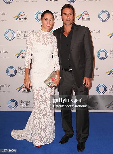 Pat Rafter and his wife Lara Feltham arrive ahead of the 2012 John Newcombe Medal at Crown Palladium on December 3, 2012 in Melbourne, Australia.