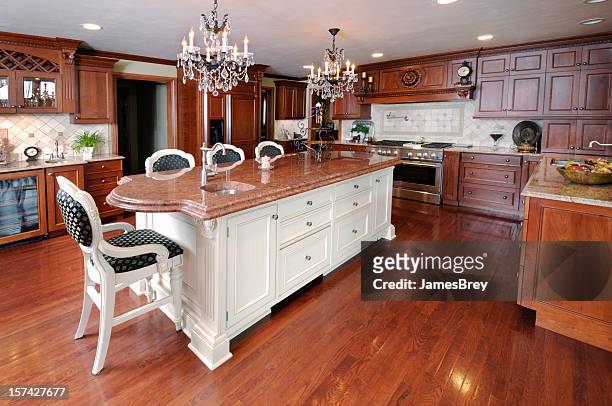 dream kitchen, dark hardwood floors, cabinets, chandelier, marble granite counters - the oak room stock pictures, royalty-free photos & images