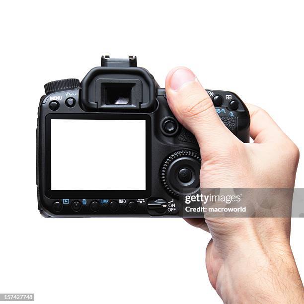 close-up of camera taking a photo - digital single lens reflex camera stock pictures, royalty-free photos & images