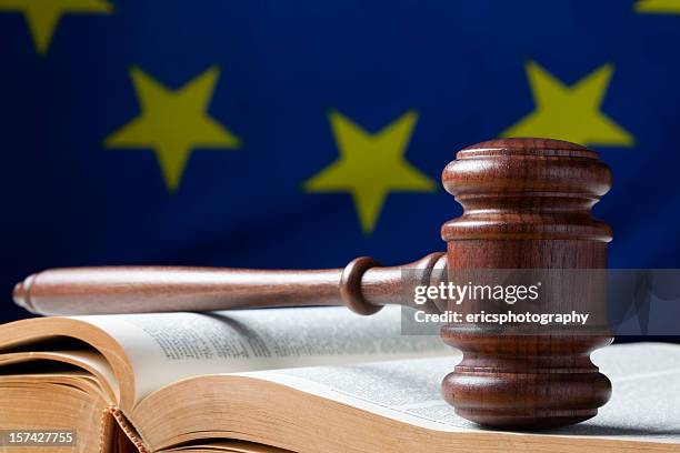 judges gavel on book with flag in back - eu flag stock pictures, royalty-free photos & images