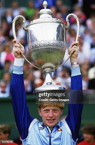 Boris Becker of Germany poses with the winning trophy after winning the Stella Artois Championships held at the Queens Club, in London. \ Mandatory...