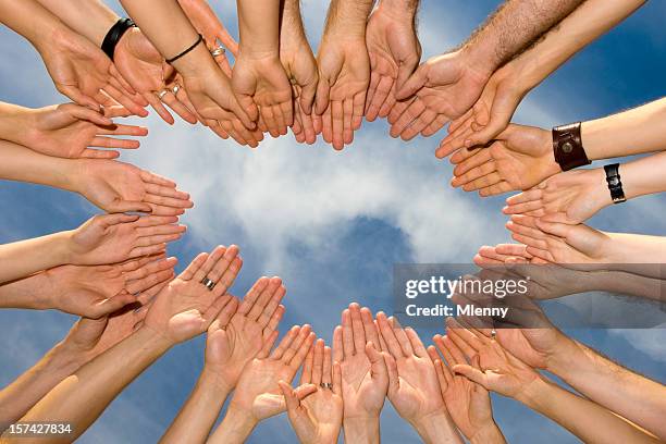 teamwork hands together - click below stock pictures, royalty-free photos & images