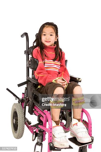 cheerful girl in wheelchair - paralysis stock pictures, royalty-free photos & images