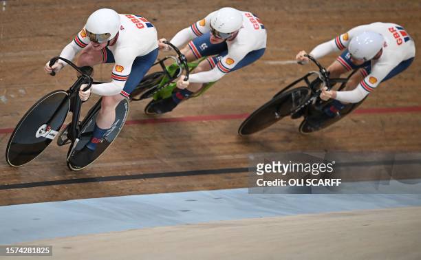 Great Britain take part in a men's Elite Team Sprint qualification race at the Sir Chris Hoy velodrome during the UCI Cycling World Championships in...