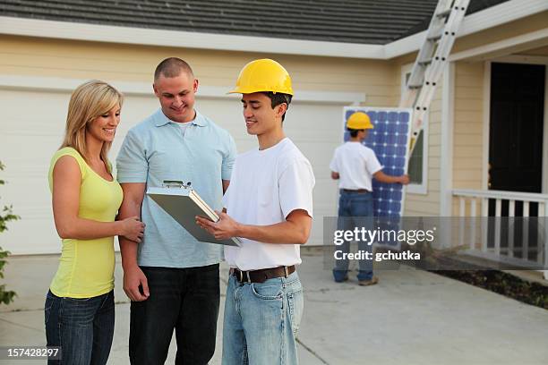 homeowners going solar - solar panel installation stock pictures, royalty-free photos & images