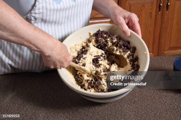 stirring cookie dough - biscuit dough stock pictures, royalty-free photos & images