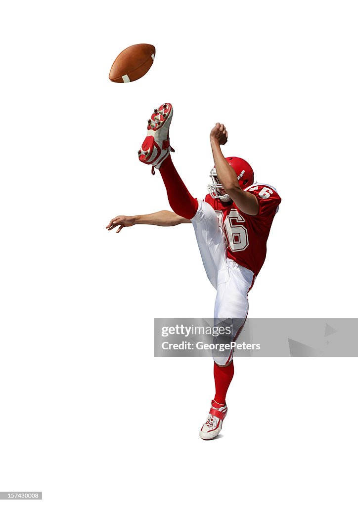 Football Player Kicking Ball with Clipping Path