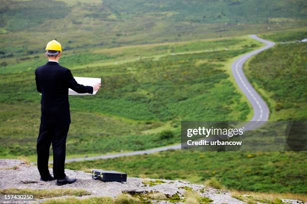 road planning - land surveyor stock pictures, royalty-free photos & images