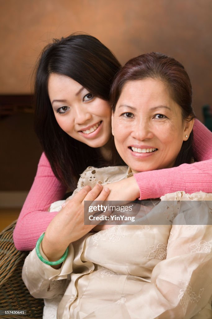 Asian Mother and Daughter, a Loving Chinese, Vietnamese Family Hugging