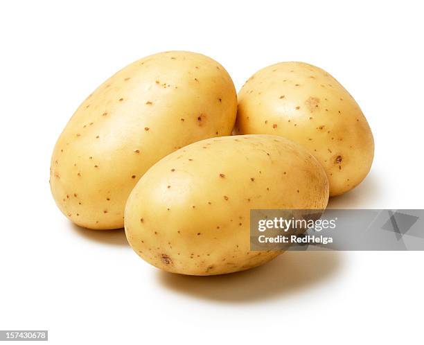 tre patate - patata cruda foto e immagini stock
