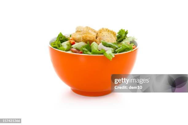 salad in bowl - salad bowl stock pictures, royalty-free photos & images