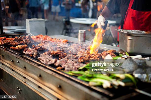 outdoor bbq grill w/flame - catering stockfoto's en -beelden