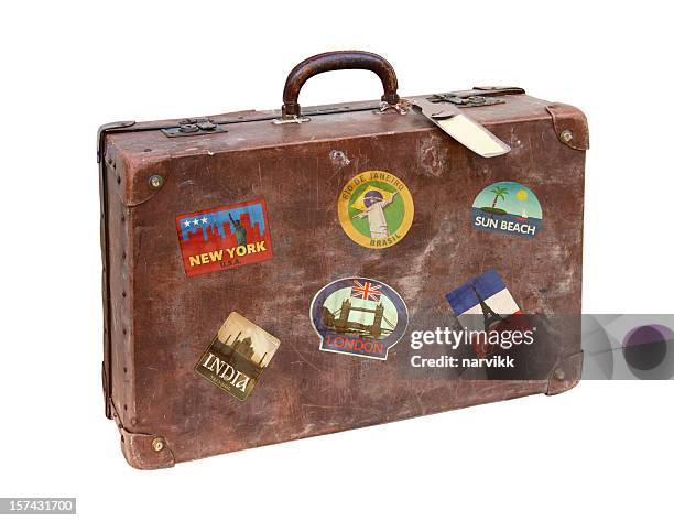 old used suitcase with travel stickers - bagagelapp bildbanksfoton och bilder