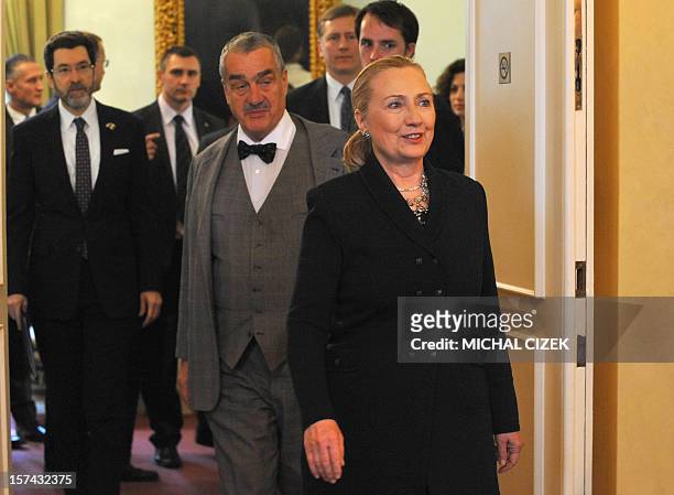 Secretary of State Hillary Clinton and Czech Foreign Minister Karel Schwarzenberg arrive for a meeting on December 3, 2012 in Prague. Clinton arrived...