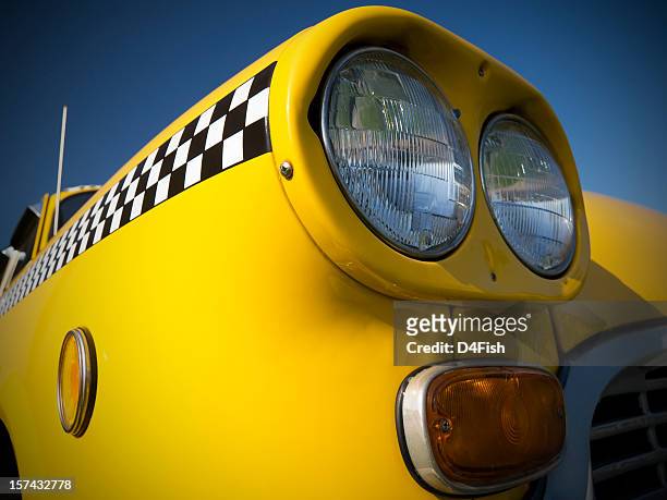 headlights - yellow taxi stockfoto's en -beelden