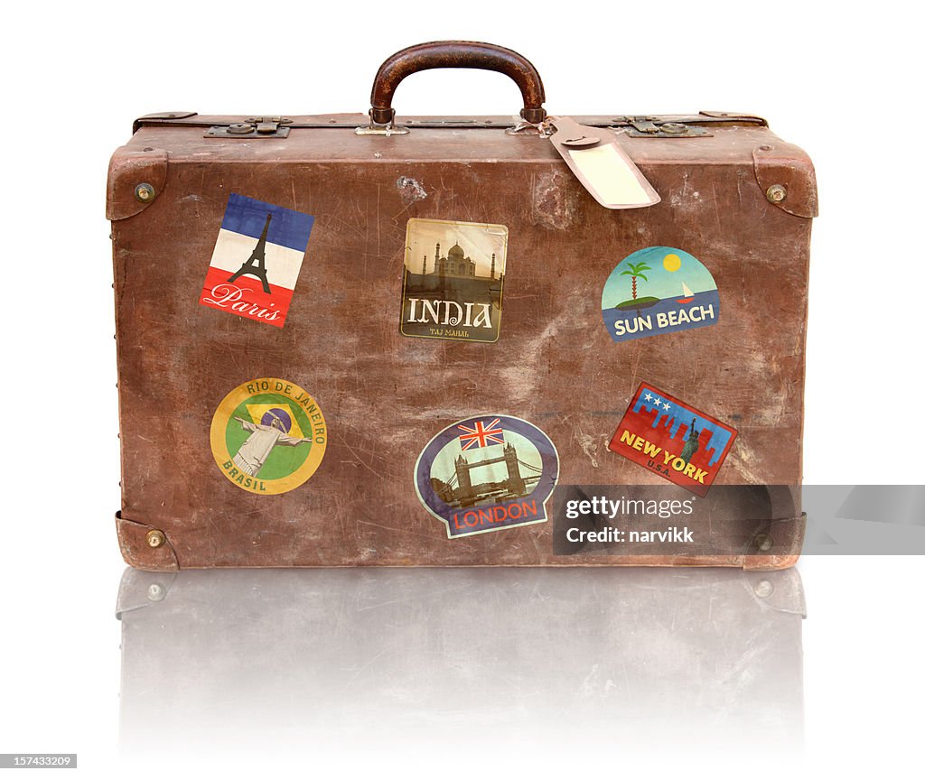 Old Used Suitcase With Travel Stickers