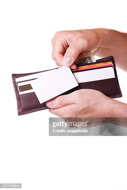 hand putting business card in wallet - human hand positions stock pictures, royalty-free photos & images