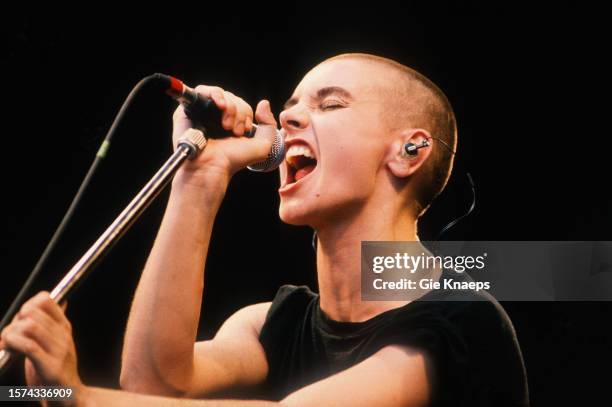 Irish singer Sinead O'Connor performs on stage at Torhout/Werchter Festival, Torhout, Belgium, 7th July 1990.