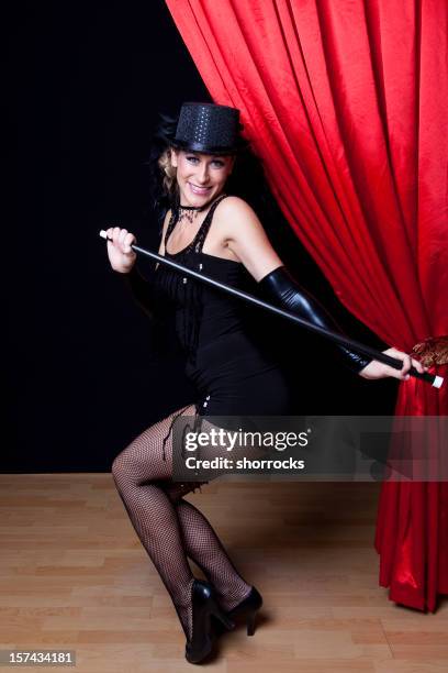 cabaret showgirl on stage - dance cane stock pictures, royalty-free photos & images