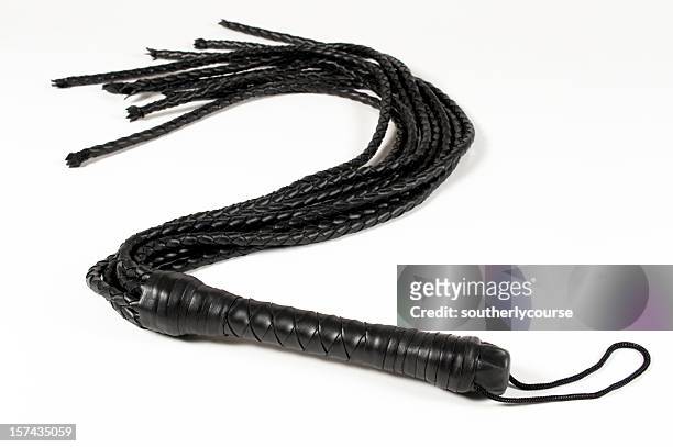 black leather whip - fetisj stock pictures, royalty-free photos & images