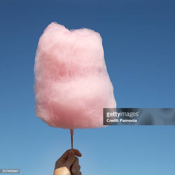 cute, pink, sweet cotton candy above the sky  - cotton candy stock pictures, royalty-free photos & images