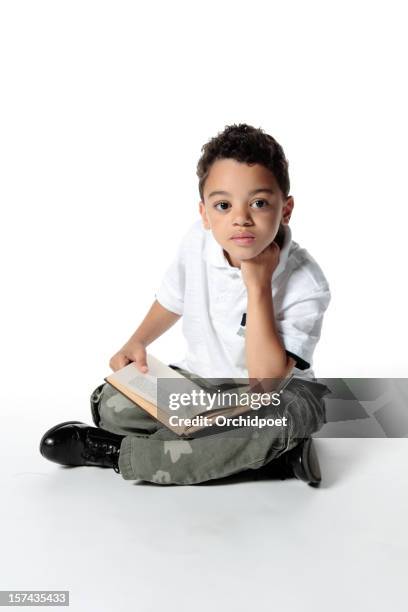 young reader - sitting on ground stock pictures, royalty-free photos & images