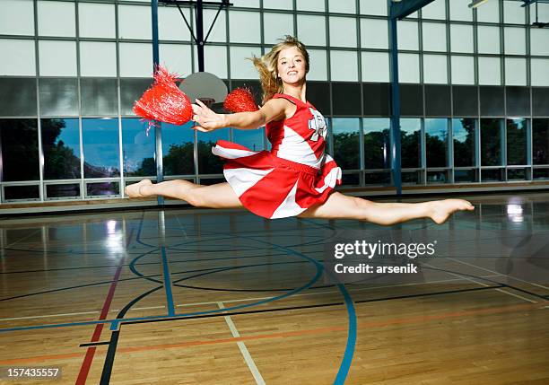 cheerleader - cheerleader photos stock pictures, royalty-free photos & images