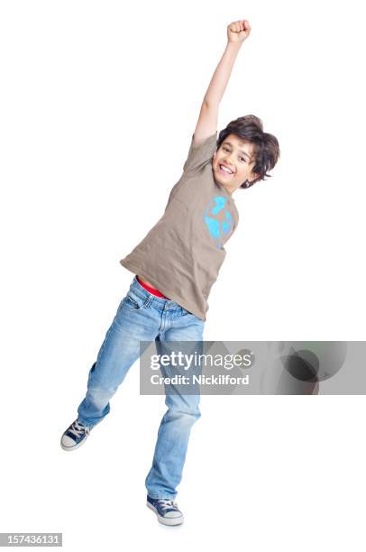 boy punching the air - jeans for boys stock pictures, royalty-free photos & images