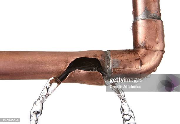 broken leaking copper water pipe - pipe stock pictures, royalty-free photos & images
