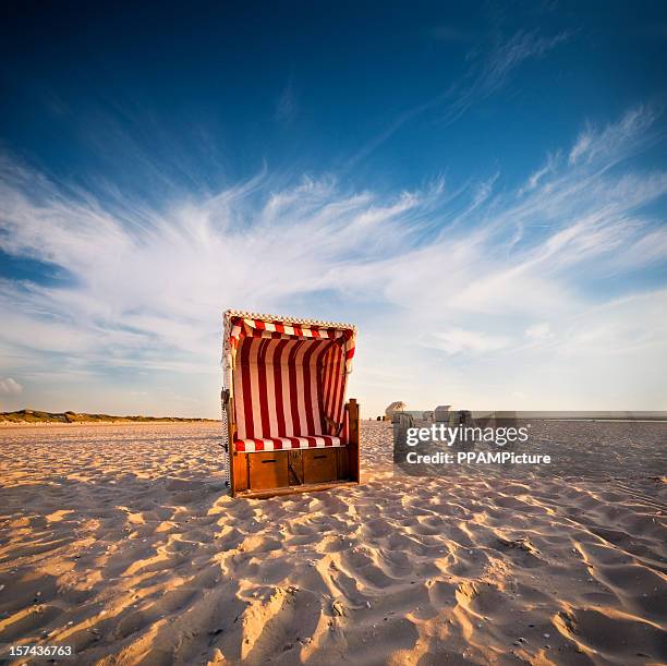 beach chair - beach shelter stock pictures, royalty-free photos & images