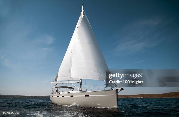 sailboat - sunset society stock pictures, royalty-free photos & images