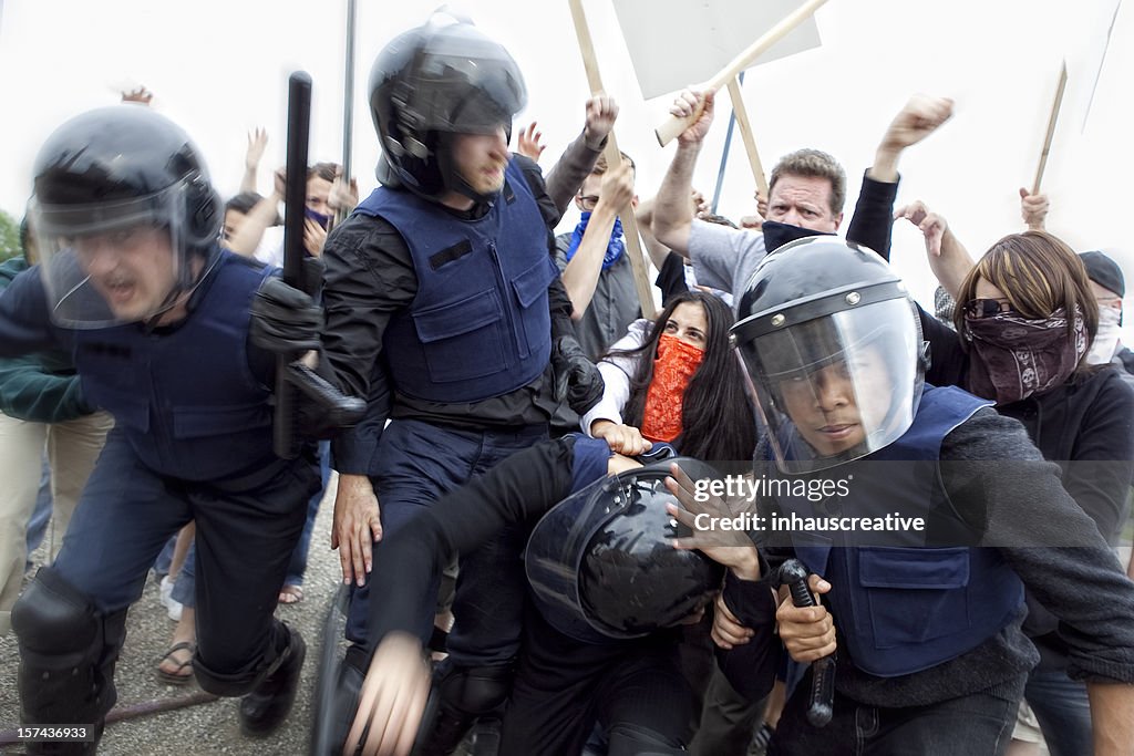 Riot Police Fight Angry Mob