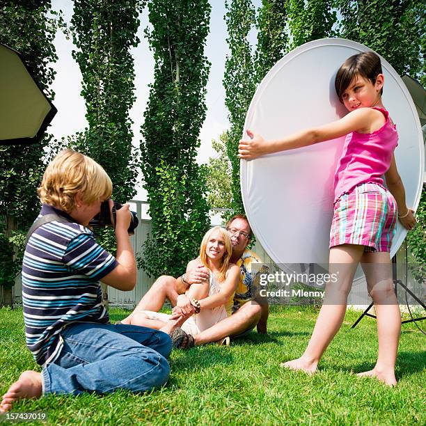 kids' photo shoot -turn upside down concept - reflector stock pictures, royalty-free photos & images