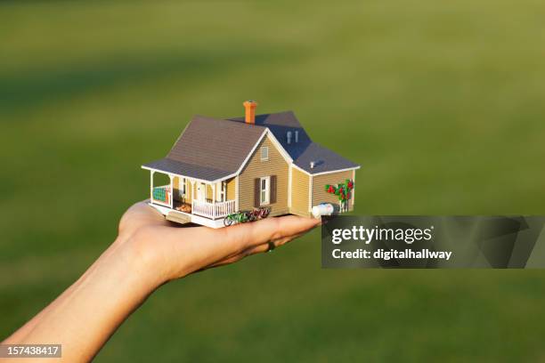 handing over a house - exterior colors for small houses stock pictures, royalty-free photos & images