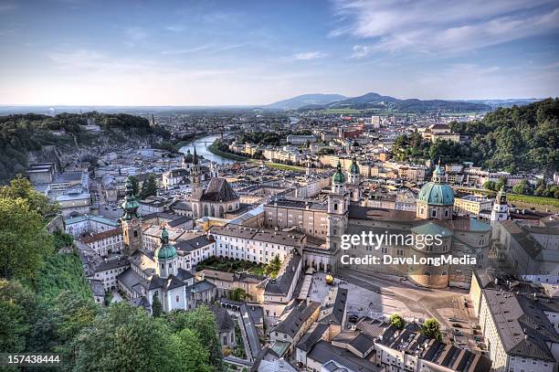 aerial view of salzburg austria with mountains in distance - salzburg stock pictures, royalty-free photos & images